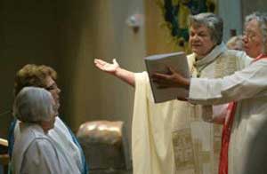 Former nun and seminary professor turned Womanbishop ordains priestesses at a synagogue. Bishopess ordaining Womenpriests